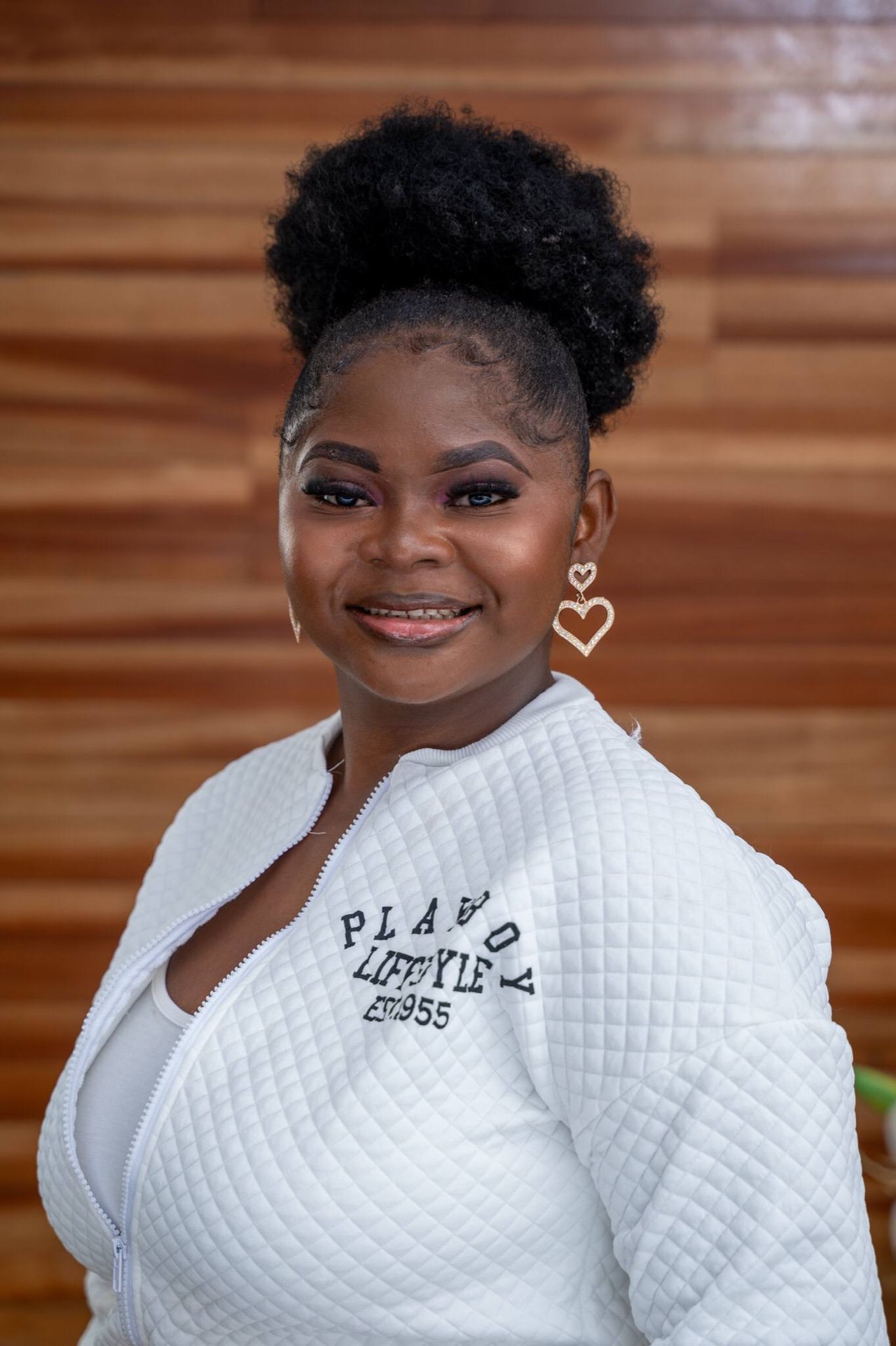 Portrait of Forchulah Unela, Main Graphics Designer at 3H Foundation